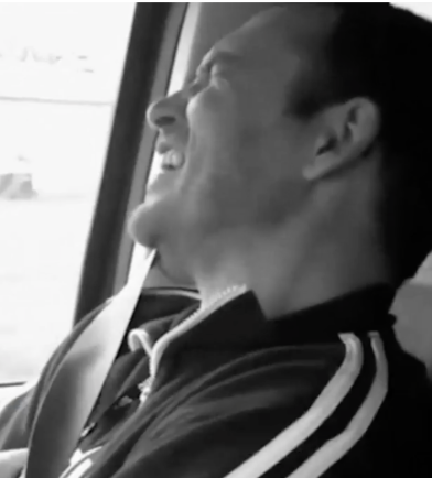 Male patient experiencing a Pseudobulbar Affect (PBA) laughing episode