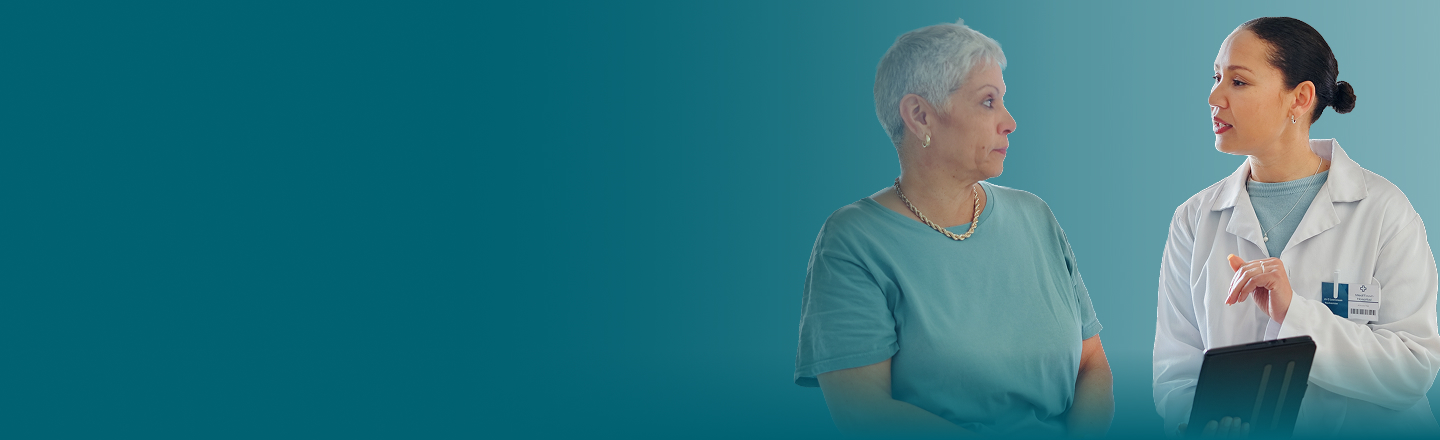 Mary Beth, female patient with PBA in her 40s, talking to a doctor