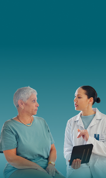 Mary Beth, female patient with PBA in her 40s, talking to a doctor